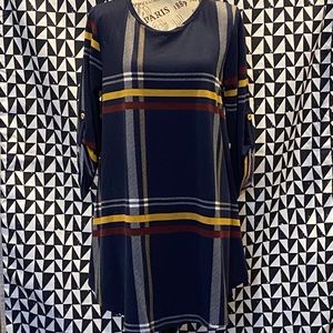 Navy tunic, mustard, cream and maroon stripes.